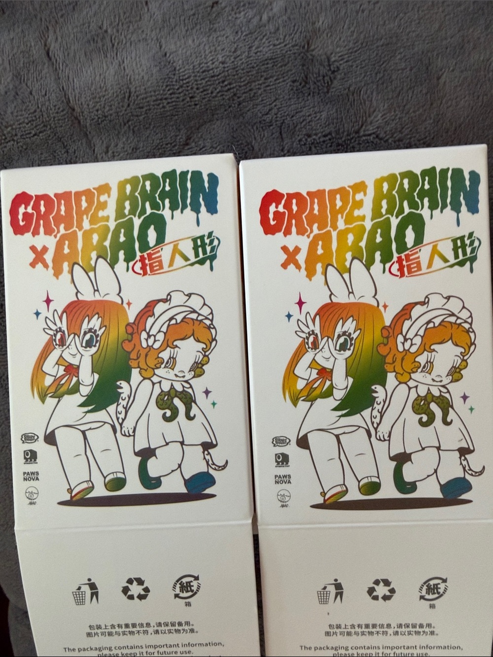 Bundle of 2 Grape Brain x ARAO Rainbow series Figures.